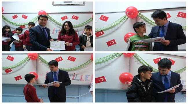 Öğrencilerin Karnesi Kaymakam Cankanoğlu'nun Ellerinden